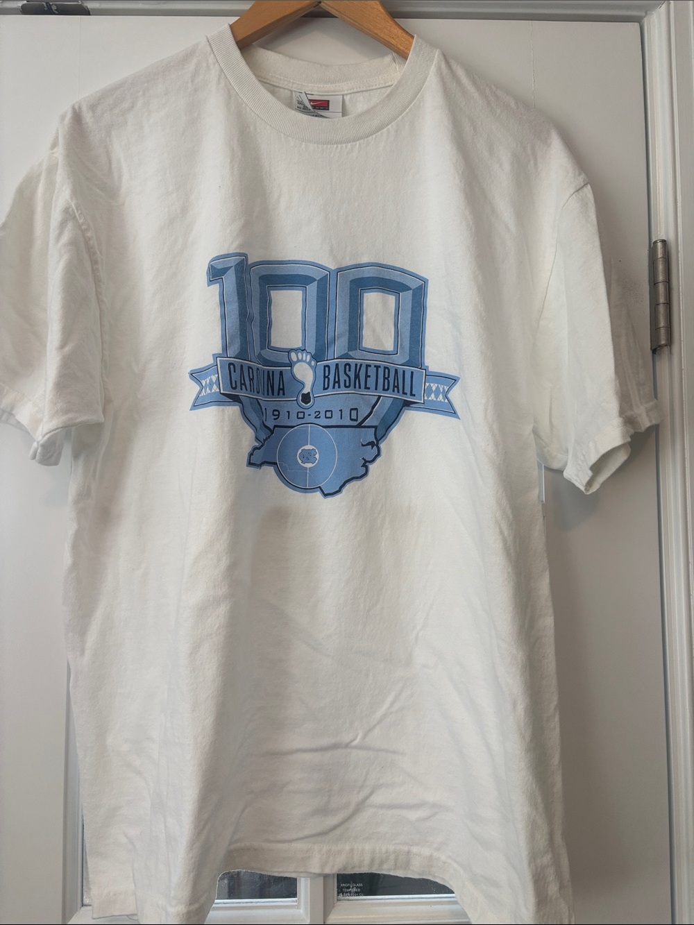 Nike White Short Sleeve T‑Shirt with Blue Carolina Basketball Graphic